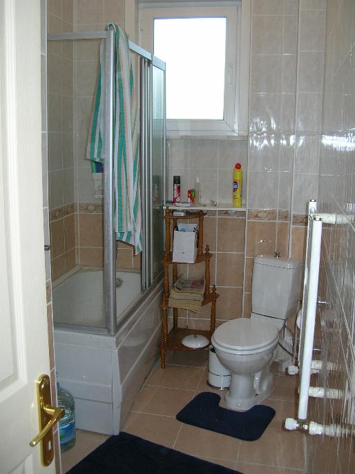 the bathroom and kitchen get the morning light